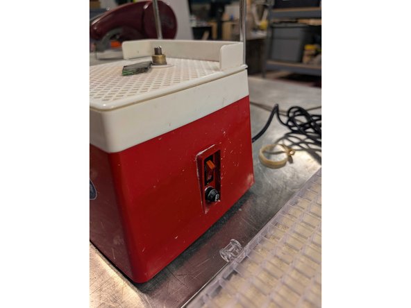 The grinder bit is embedded with pieces of diamond. It cuts hard things quickly and doesn't cut soft things. For instance, it is unlikely to harm your fingertips but may grind your fingernail. In any case, do not touch the bit while it is moving.