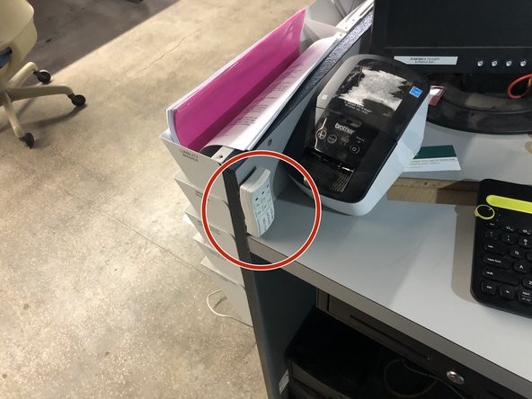 Turn on the 3 light switches on the front desk