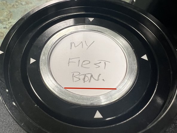 Try to align the button horizontally. (If this is important to aligning the pin back with the design)