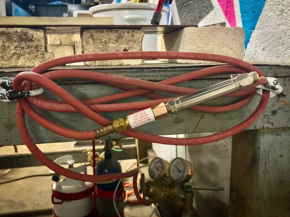 Open valve on torch to purge. Regulator should return to zero. If it does not return to zero, contact a volunteer or make a post on the talksite.