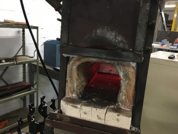 Attend until the forge interior is no longer glowing.