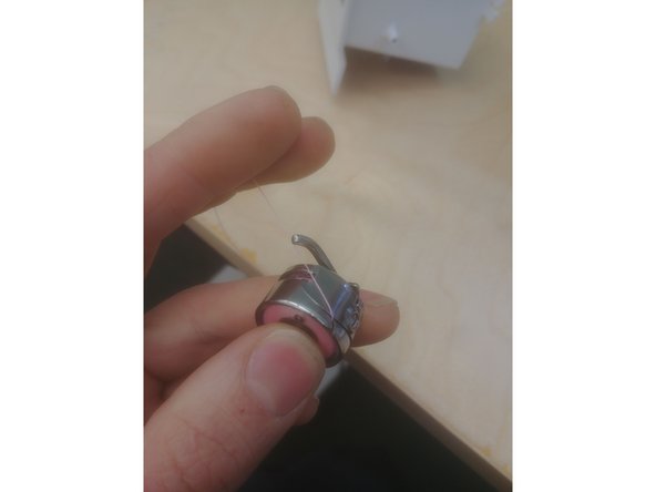 You should have a wound bobbin from the previous step.