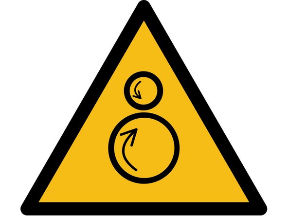 Remove or secure loose clothing, hair, lanyards, or anything which could be caught in a moving part of the machine before operating.