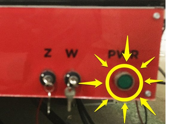 Press the green &quot;PWR&quot; button on the control panel.