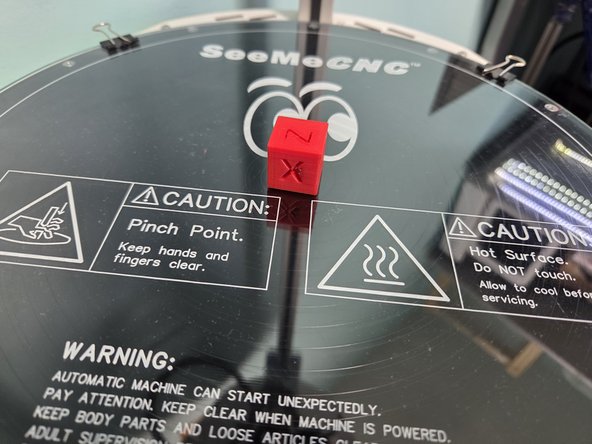 Make sure you watch the first couple layers for print errors, and after some time your 3D print will be done, looking like the first image. An XYZ test cube is being used here as an example.
