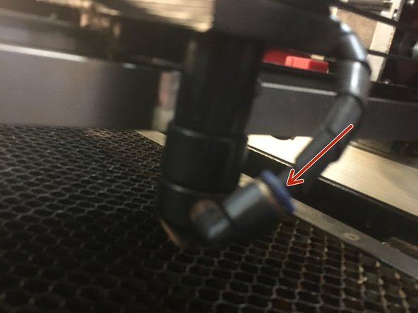 Reinstall the air assist hose by pushing the hose into the connector.