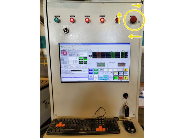 Twist the E-stop clockwise to release the switch.