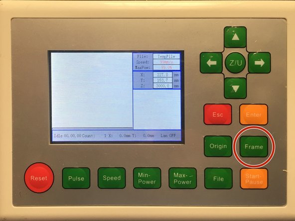Press the Frame key to have the laser cutter draw a box around the outline of your job.