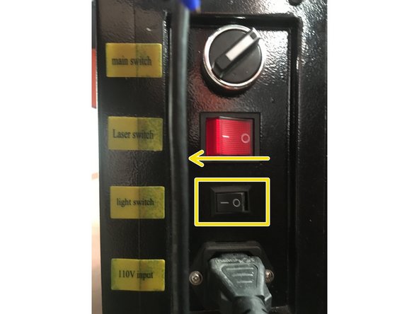 Turn the fluorescent work light ON by flipping the switch on the side of the machine toward the “I”.