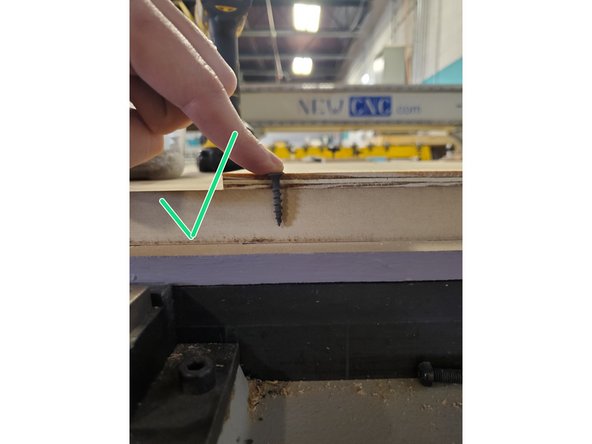 Arrange the top spoil board panels if necessary.