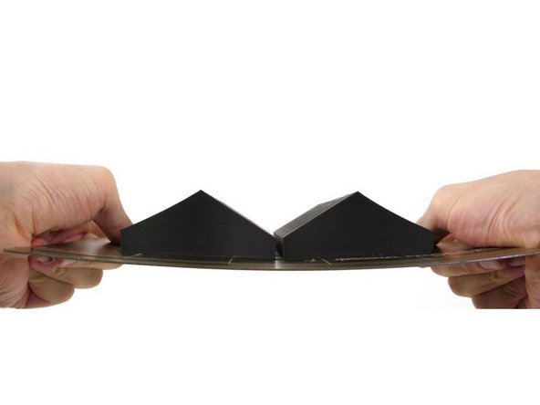 Be careful to not lift so high as to scrape the bottom of the hot-end.  If needed raise the carriage (press and hold the control button).