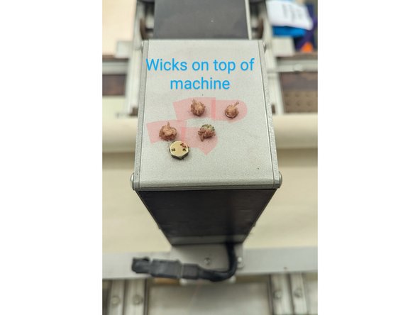 Before starting the machine, and every 4 hours of running time apply 1 drop of sewing machine oil to each of the 4 wicks on the top of the machine.