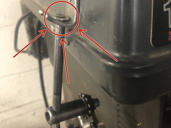 Return the chuck key to its hook on the side of the machine.