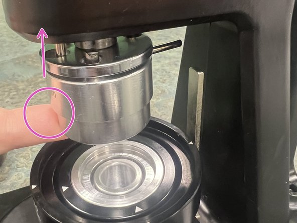 The pin on the back of the top mold will prevent sliding the mold tray all the way out.