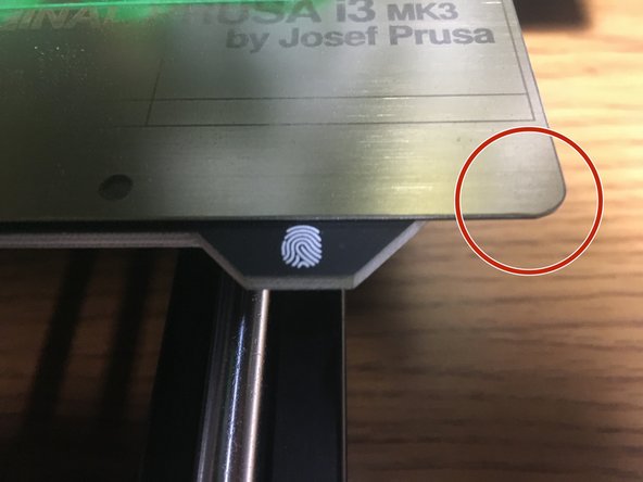 Lift the steel sheet off the printer by lifting it at the corners.