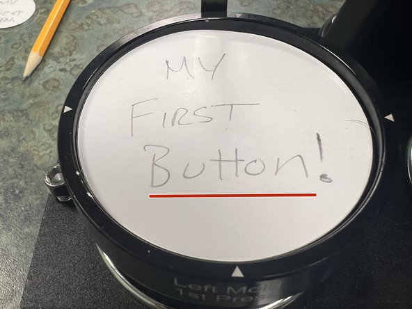 Place the paper design into the LEFT mold, on top of the button top.