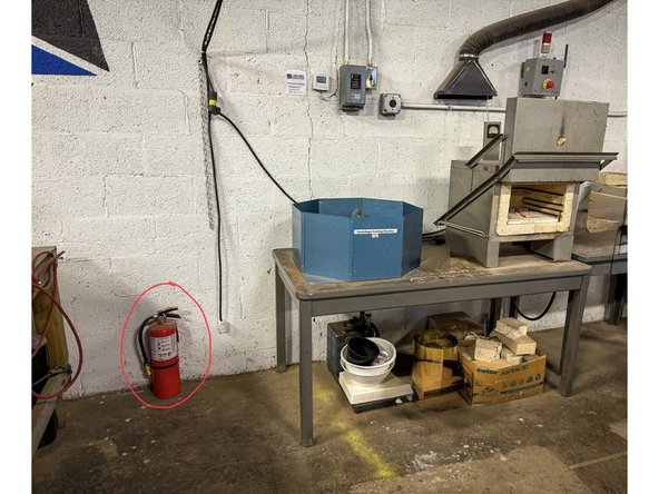 Always be careful when opening the kiln door when the kiln is heated. Never wear loose-fitting clothing around a hot kiln. Always pull your hair back. Note the location of the nearest fire extinguisher.
