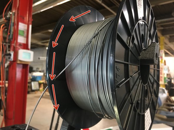 Install the new spool on the hook.