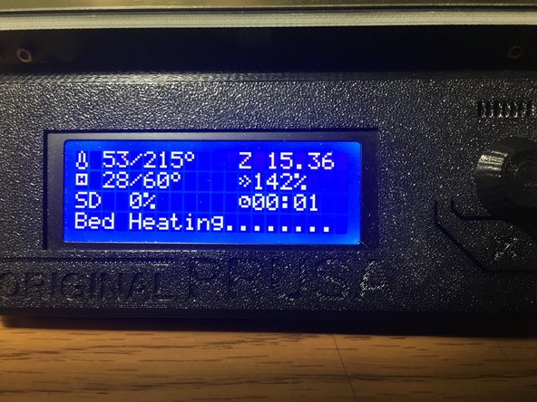 The display will show bed heating until the nozzle and bed are up to temperature.