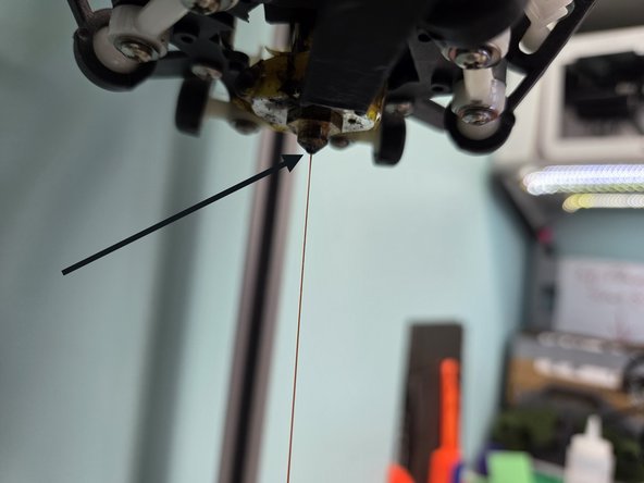 Continue to feed filament out of the nozzle until it is the same color as the filament you are feeding in. This is done because some of the previous filament used by the printer is left in the nozzle and could discolor part of your 3D print.