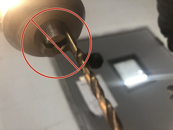 Inspect the check to ensure that the drill bit is centered in the chuck jaws before' tightening with the chuck key.