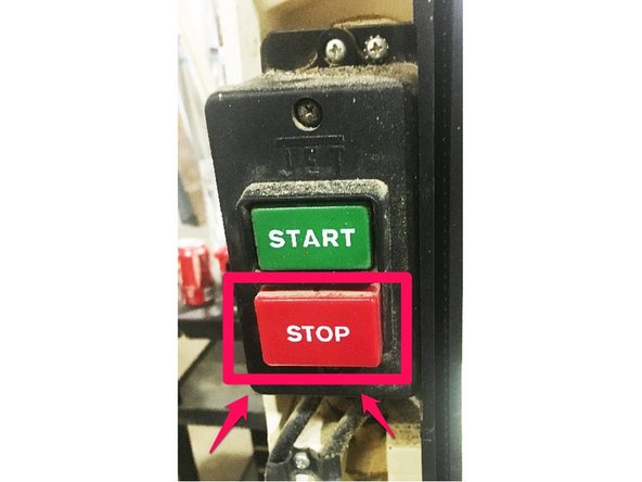 Press the stop button to turn off the saw.