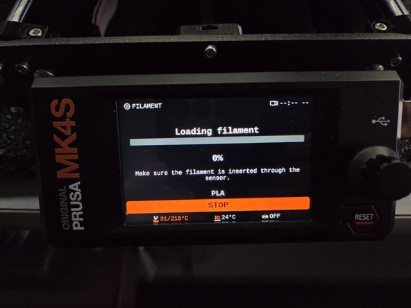 The screen should look the same as the first image. Noticeably only showing a stop button.