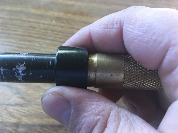 Use the lens wrench to tighten the retaining ring against the lens.