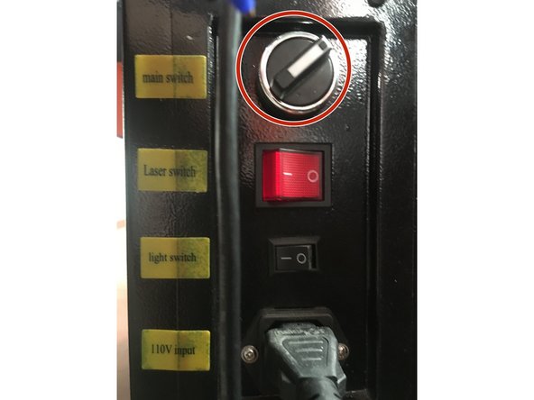 Turn off main switch by rotating the switch toward the front of the machine.