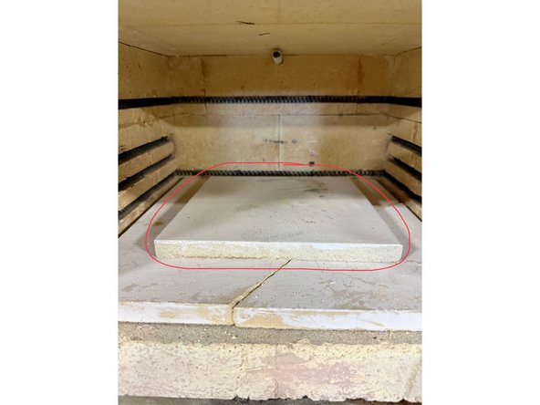 IMPORTANT: Before turning the kiln on: Make sure the kiln shelf is in the kiln, on the bottom of the kiln floor. Inspect it to see if it's evenly coated with kiln wash and that it doesn't have any worn, loose, chipped or flaky areas, exposing the bare kiln shelf.
