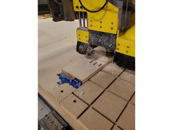 Clean dust and debris from stock and corresponding area on the machine.