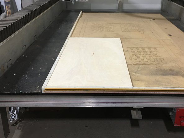 Secure your material to the bed of the machine using clamps or screws.