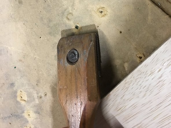 Scrape any screw puckers created by your affixing material to the spoilboard.