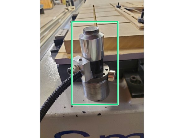 Place the tool length sensor on the stud. It should sit flat and be held by the magnets.