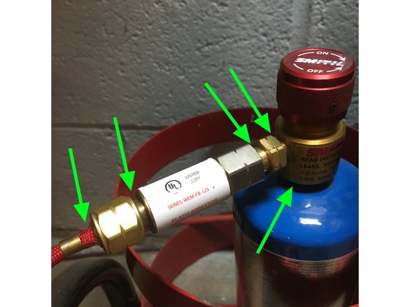 Brush soapy water mix all the way around all five joints and fittings