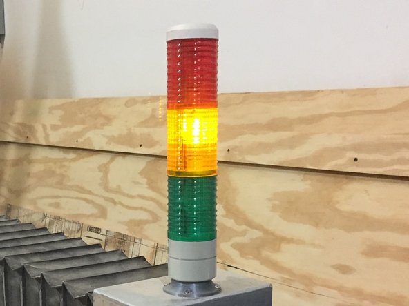 The light stalk will illuminate YELLOW indicating that the spindle control is armed.