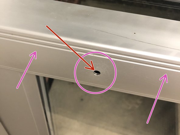 Turn the allen key clockwise while holding in the crash bar.