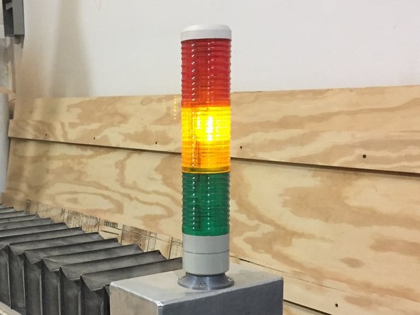 The GREEN led indicates that the machine is powered, but the spindle control system DOES NOT have power.