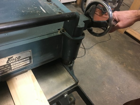 Hard woods require shallower passes than soft woods, and a wider board requires shallower passes than a narrower board.