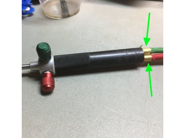 brush soapy water mixture all the around  all hose fittings.