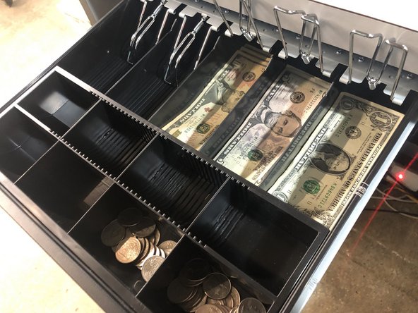 Count down the cash in the drawer.