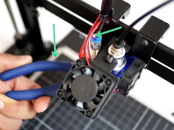 Whilst holding a metal object under the probe (a red light should shine) send the M119 command.