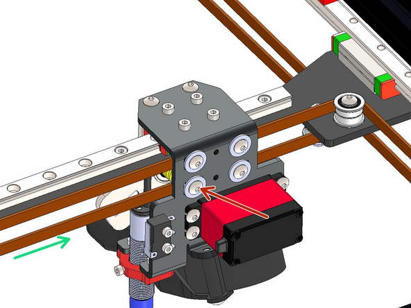 Finally feed the end of the belt into the slot on the bottom left of the bracket - again feeding it in from the inside of the bracket.