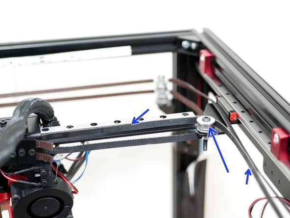 Take the remaining belt and loop it around the idler on the gantry.