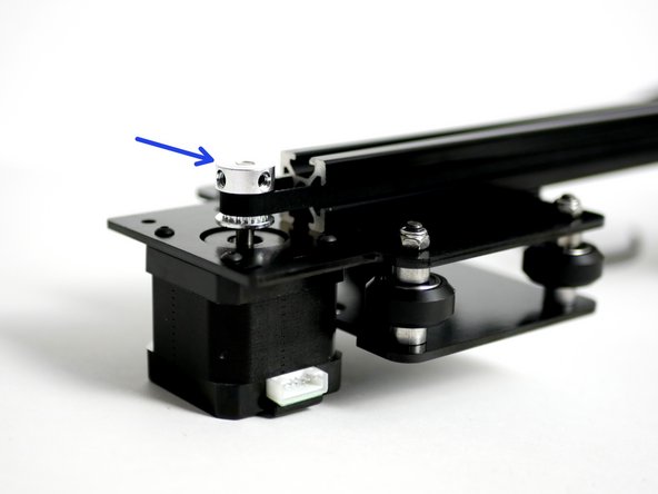 Slide the pulley up to the end of the motors shaft.