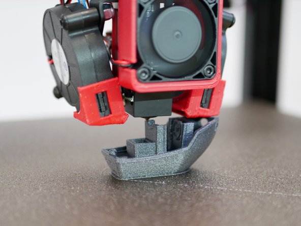 If it's too close (the nozzle is scraping the bed) or too high (the first layer is peeling away) adjust your P offset. See the previous guide for a reminder on how to do that.