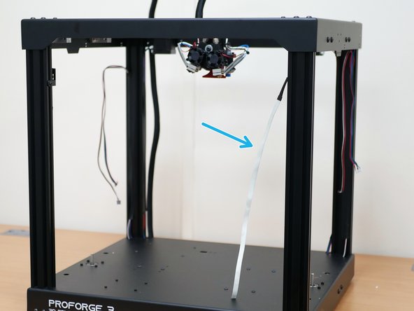 Carefully peel the LED light strip away from the top panel, try not to touch the sticky back as you're removing it, it will need to be stuck back onto the extrusion in a later step.