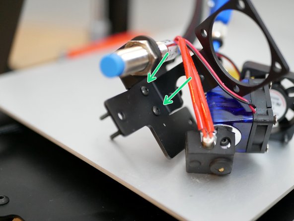 Replace the M3 x 25mm bolts on the metal tool carriage with the two M3 x 35mm bolts.