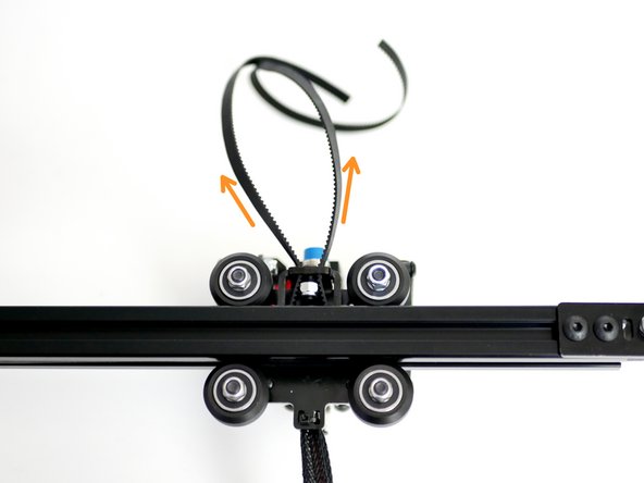 Pull the loose ends of the belt tight.