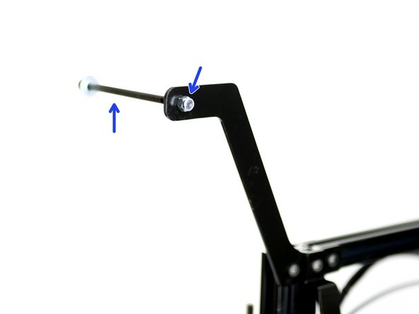 Fix the bolt to the top of the Extruder Mount with another M5 Nyloc nut.